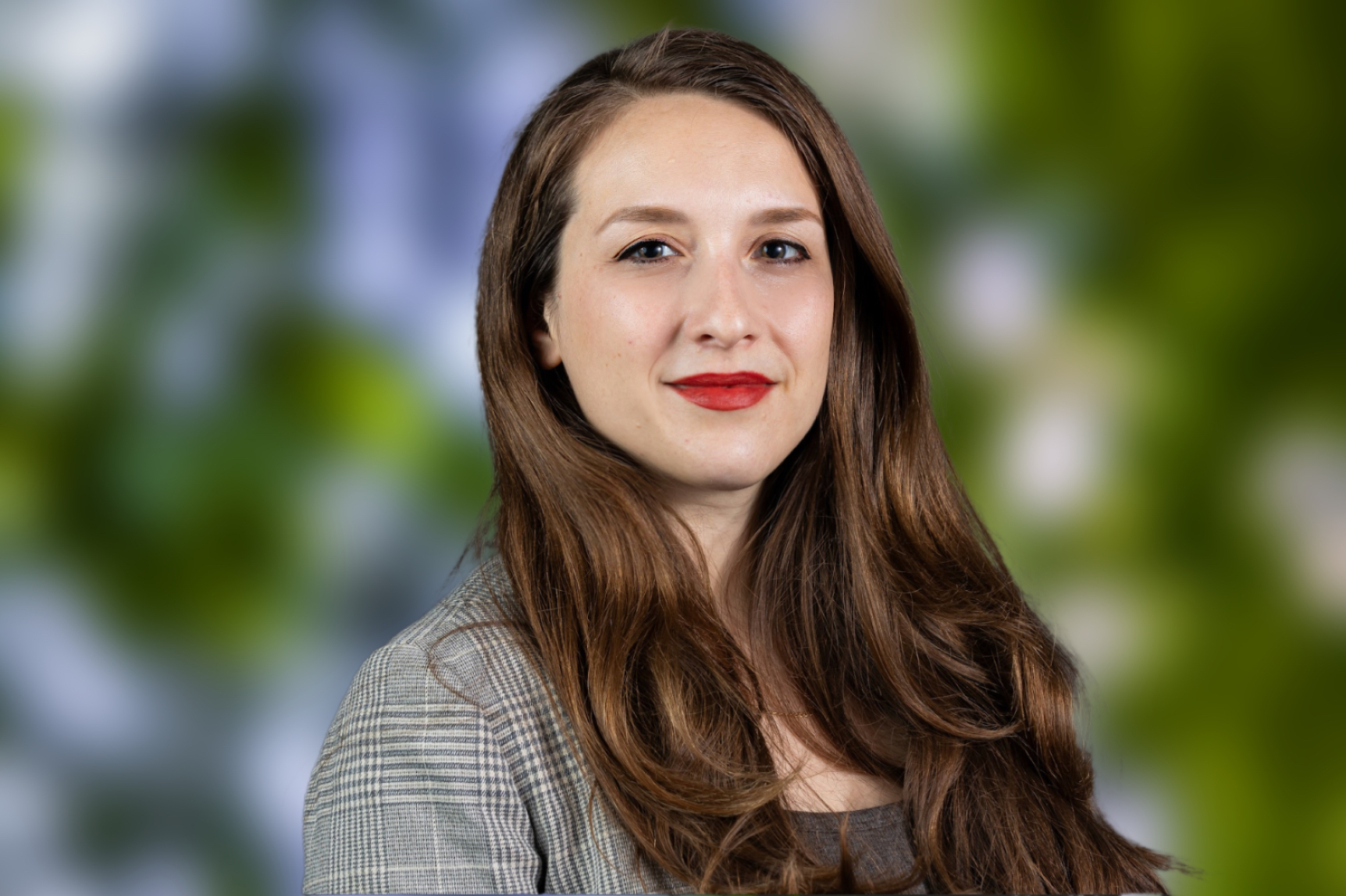 Jackie Headshot Blur Background Jackie Strack COO D-Kode Tech